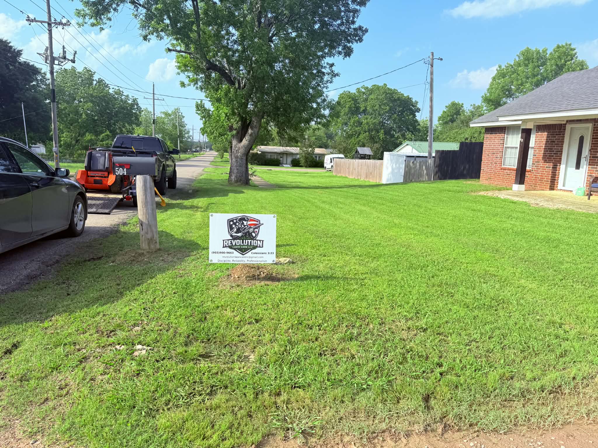Finished lawn service by Revolution Lawn Care